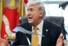 US Accuses China of ‘AI Distillation’ Theft Ahead of Trump’s Beijing Visit, Tensions Rise Donald Trump speaking on China AI technology theft allegations with US-China flags and digital AI graphics