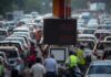 Fuel Prices Surge Again in India: Petrol Up 87 Paise, Diesel 91 Paise in Third Hike Within 10 Days Petrol pump worker filling fuel at an Indian gas station as petrol and diesel prices rise in major cities