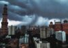 India Weather Update: Rain, Thunderstorms and Heatwave Conditions Expected Across Several States Dark storm clouds gather over New Delhi as heavy rain and thunderstorms approach northern India during a fresh western disturbance