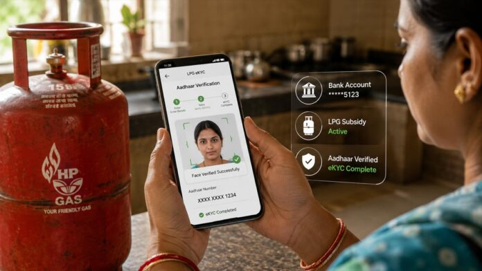 lpg-subsidy-ekyc-online-dea Woman using mobile phone to complete LPG gas subsidy eKYC verification online in India