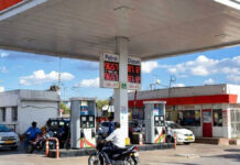 Petrol-Diesel Price Hike Hits India Again as Fuel Rates Rise for Fourth Time in 10 Days Petrol and diesel prices rising in India with fuel station price boards showing increased rates