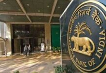 RBI May Announce Record-Breaking Dividend to Indian Government Amid Global Economic Uncertainty Reserve Bank of India headquarters building with financial charts representing record dividend transfer to the government
