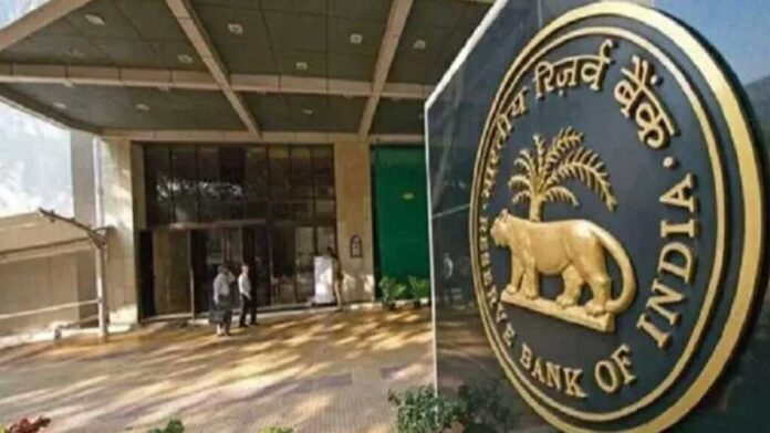 Reserve Bank of India headquarters building with financial charts representing record dividend transfer to the government