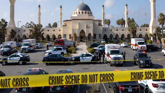 Police officers and emergency vehicles outside a mosque in San Diego after a deadly shooting incident
