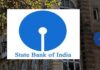 SBI Customers Alert: India’s Largest Bank May Remain Closed for Up to 6 Days Next Week SBI bank branch closed notice displayed as customers prepare for possible banking disruptions in May 2026