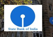 SBI Customers Alert: India’s Largest Bank May Remain Closed for Up to 6 Days Next Week SBI bank branch closed notice displayed as customers prepare for possible banking disruptions in May 2026