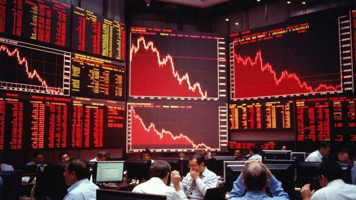 Indian stock market decline Sensex Nifty red screen trading floor Mumbai