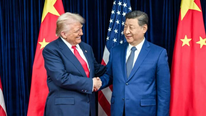 Donald Trump speaking at a podium while discussing US-China relations and criticizing the Biden administration