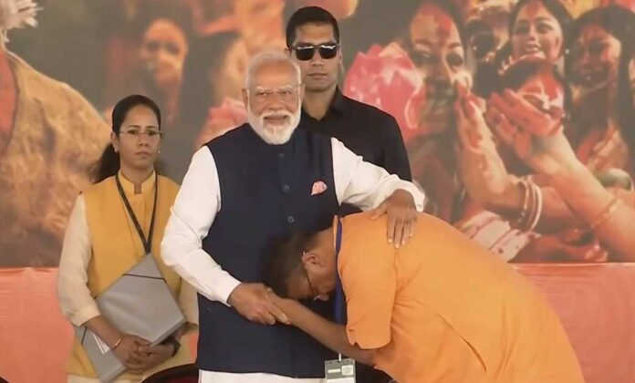 Suvendu Adhikari seeking blessings from Prime Minister Narendra Modi.
