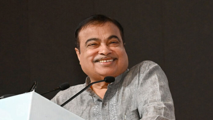 Union Minister Nitin Gadkari speaking at an event promoting 100% ethanol fuel vehicles in India.