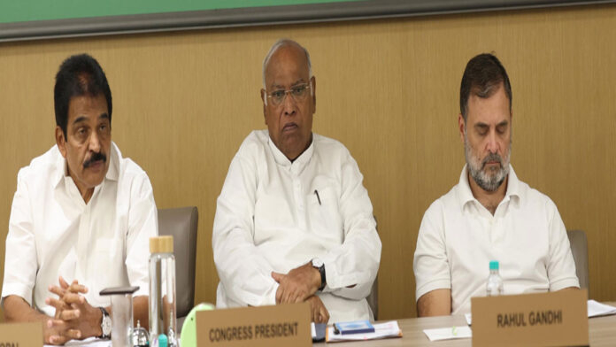 Congress General Secretary K. C. Venugopal , Congress President Mallikarjun Kharge and Rahul Gandhi SEO Title Congress Nationwide Protest Campaign Announced Over Inflation, Unemployment and Exam Paper Leak Controversies Focus Keyword Congress Nationwide Protest Campaign URL Slug congress-nationwide-protest-campaign-inflation-unemployment-exam-scandals 191-Character SEO Keywords Congress Nationwide Protest Campaign, Congress protest 2026, inflation in India, unemployment issues, exam paper leaks, NEET controversy, Rahul Gandhi, Mallikarjun Kharge, KC Venugopal Meta Description Congress Nationwide Protest Campaign will run for three months across India, focusing on inflation, unemployment, exam scandals and social inequality. Image Alt Text Congress leaders addressing a meeting while announcing a nationwide campaign against inflation, unemployment and examination scandals. Image Title Congress Announces Three-Month Nationwide Protest Campaign Image Caption Senior Congress leaders unveil a nationwide outreach and protest program targeting key economic and social issues. Image Description Congress leadership meeting at the AICC headquarters discussing political strategy, public outreach programs, inflation, unemployment, and examination-related controversies. Suggested Image File URL congress-nationwide-protest-campaign-india-2026.jpg AI Image Prompt Create a realistic political news image showing senior Congress leaders at a press conference in New Delhi. Party banners, media cameras, political workers, discussion on inflation, unemployment and youth issues, professional newsroom photography style, high-resolution image, democratic political campaign atmosphere. Congress Nationwide Protest Campaign to Target Inflation, Unemployment and Government Policies