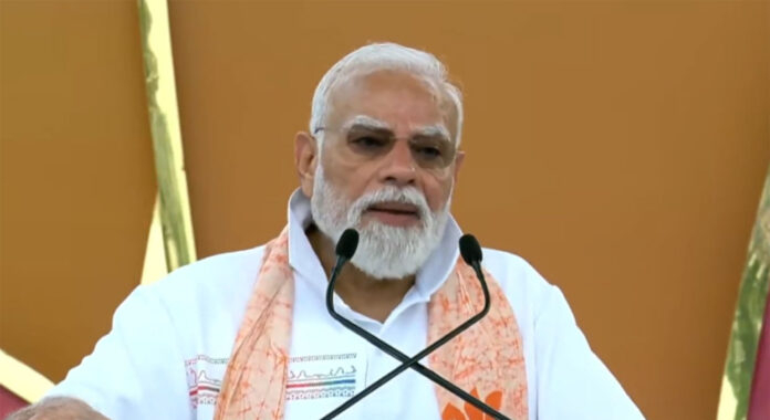 international-yoga-day-2026 Prime Minister Narendra Modi participates in a mass yoga session during International Yoga Day 2026 celebrations at Kolkata's historic Red Road.