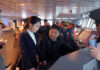 Kim Jong Un Inspects New Destroyer Warship, Vows Faster Naval Nuclear Expansion North Korean leader Kim Jong Un inspecting the Kang Kon destroyer during sea trials as military officials accompany him.